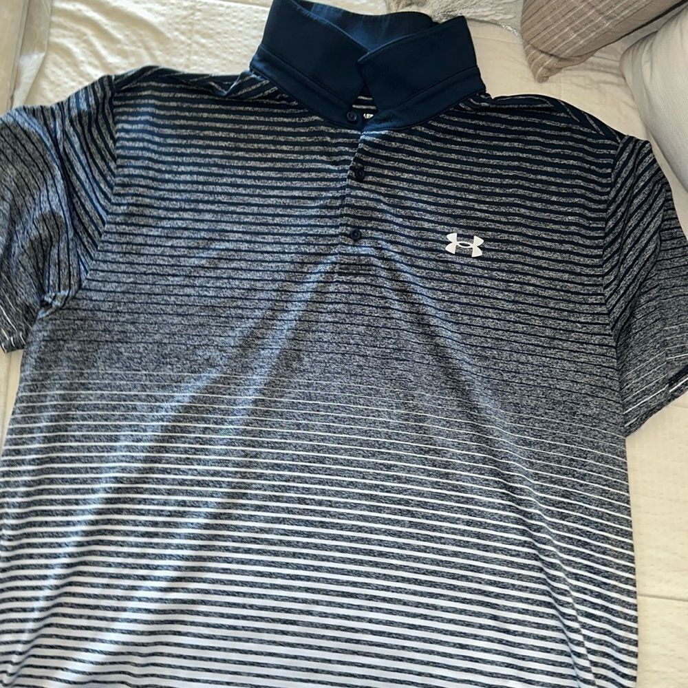 Men’s under armour golf shirt. New condition